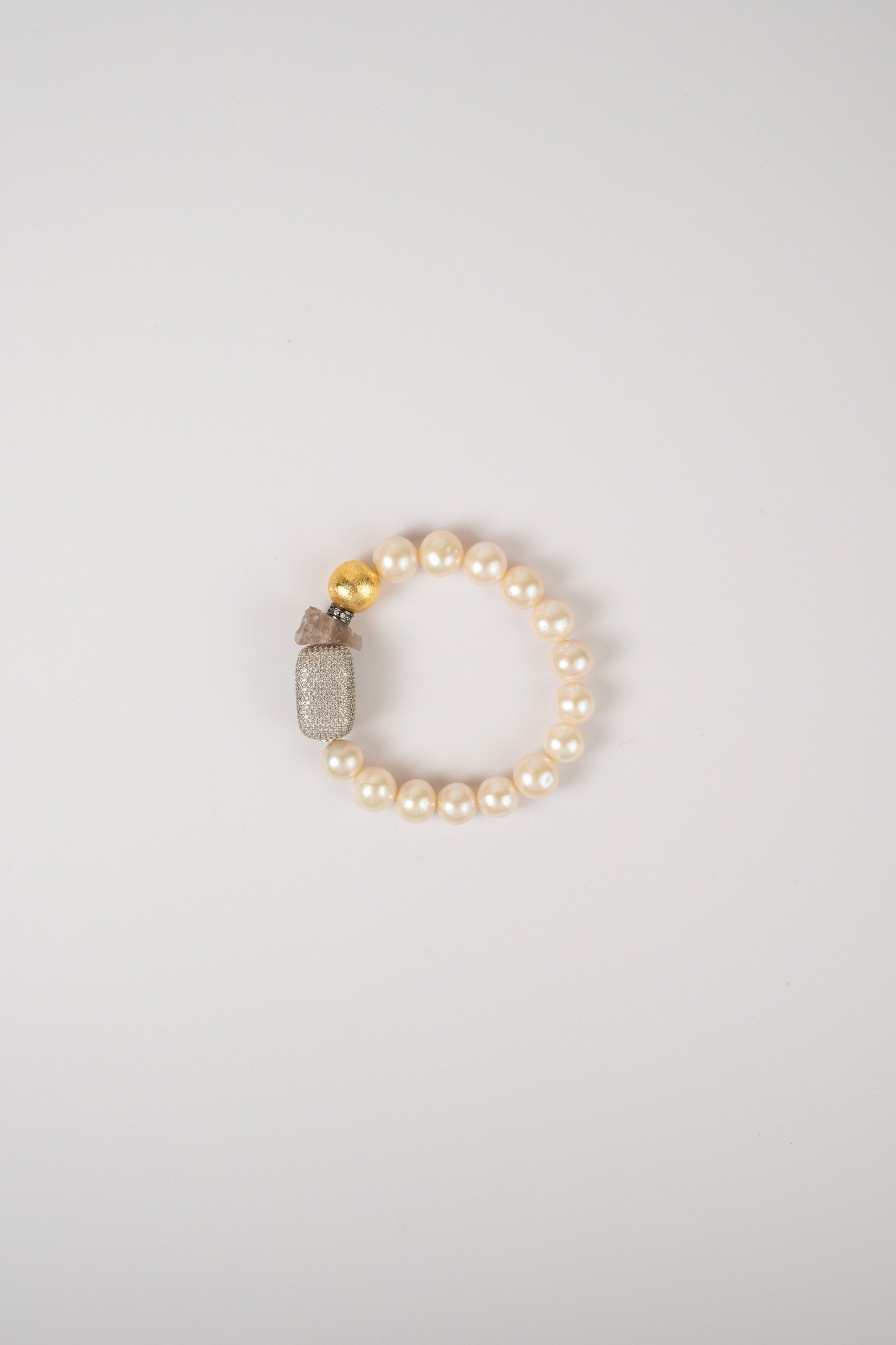 Pulsera Elástica Perla con Dije Plata Grande y Bola Chapa